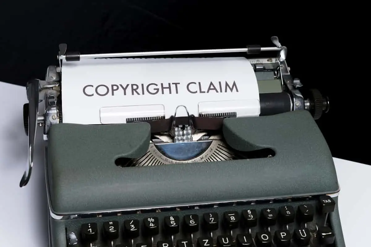 Close-up of a vintage typewriter with a sheet of paper loaded that reads 